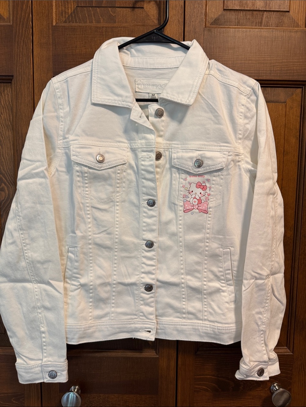 Maurices White Denim Jacket with Pink Hello Kitty Accent